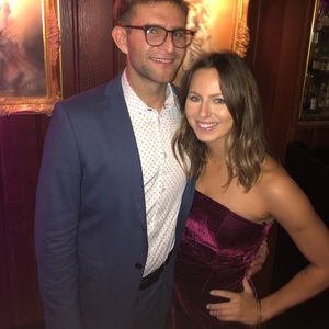 Red velvet cocktail dress. Strapless. Small slit. Midi length.